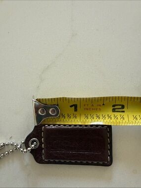 Coach Hang Tag